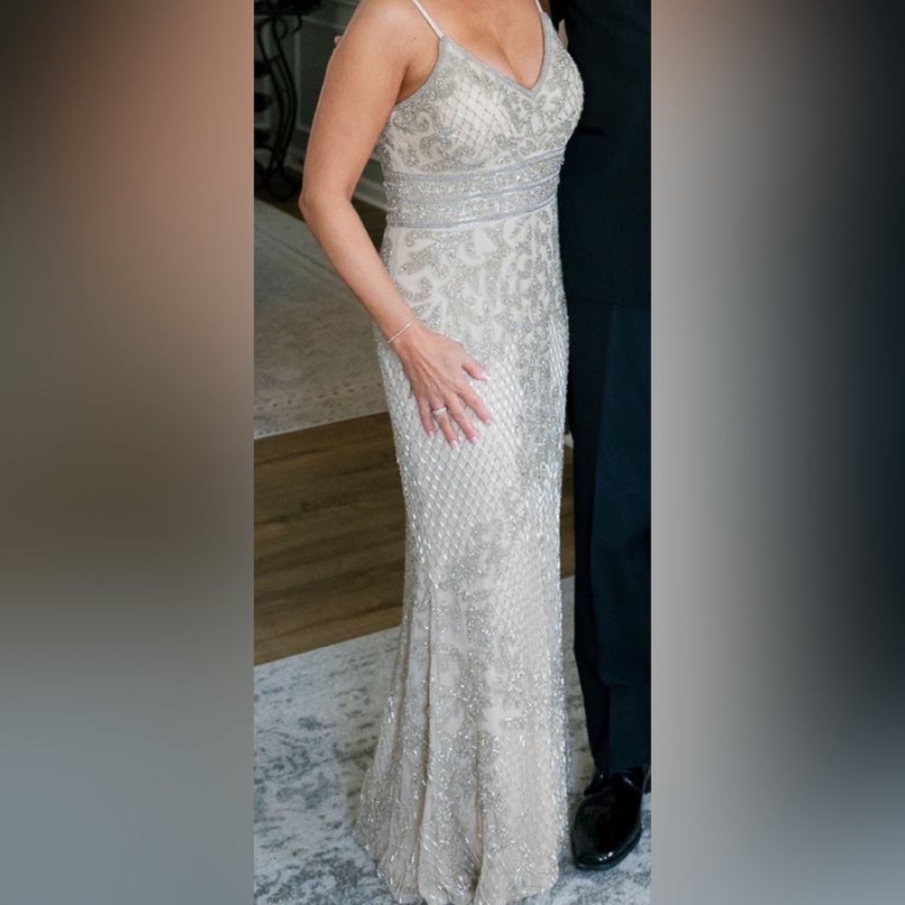 Formal stunning Beaded Gown with beautiful faux fur shawl.